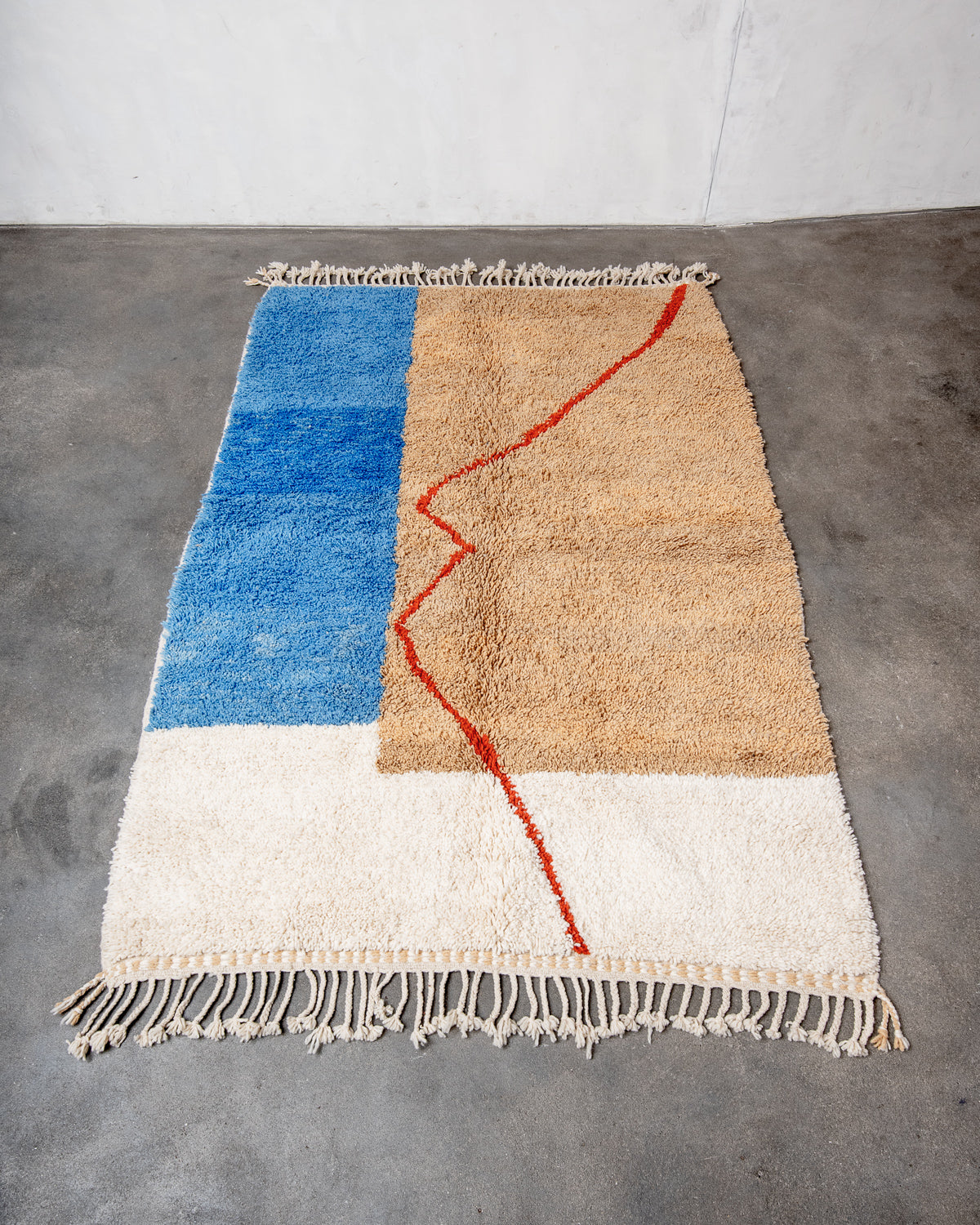 Modern, designer, handcrafted Berber rug from Morocco. Beniourain carpet with beautiful colours and patterns and fluffy wool texture.